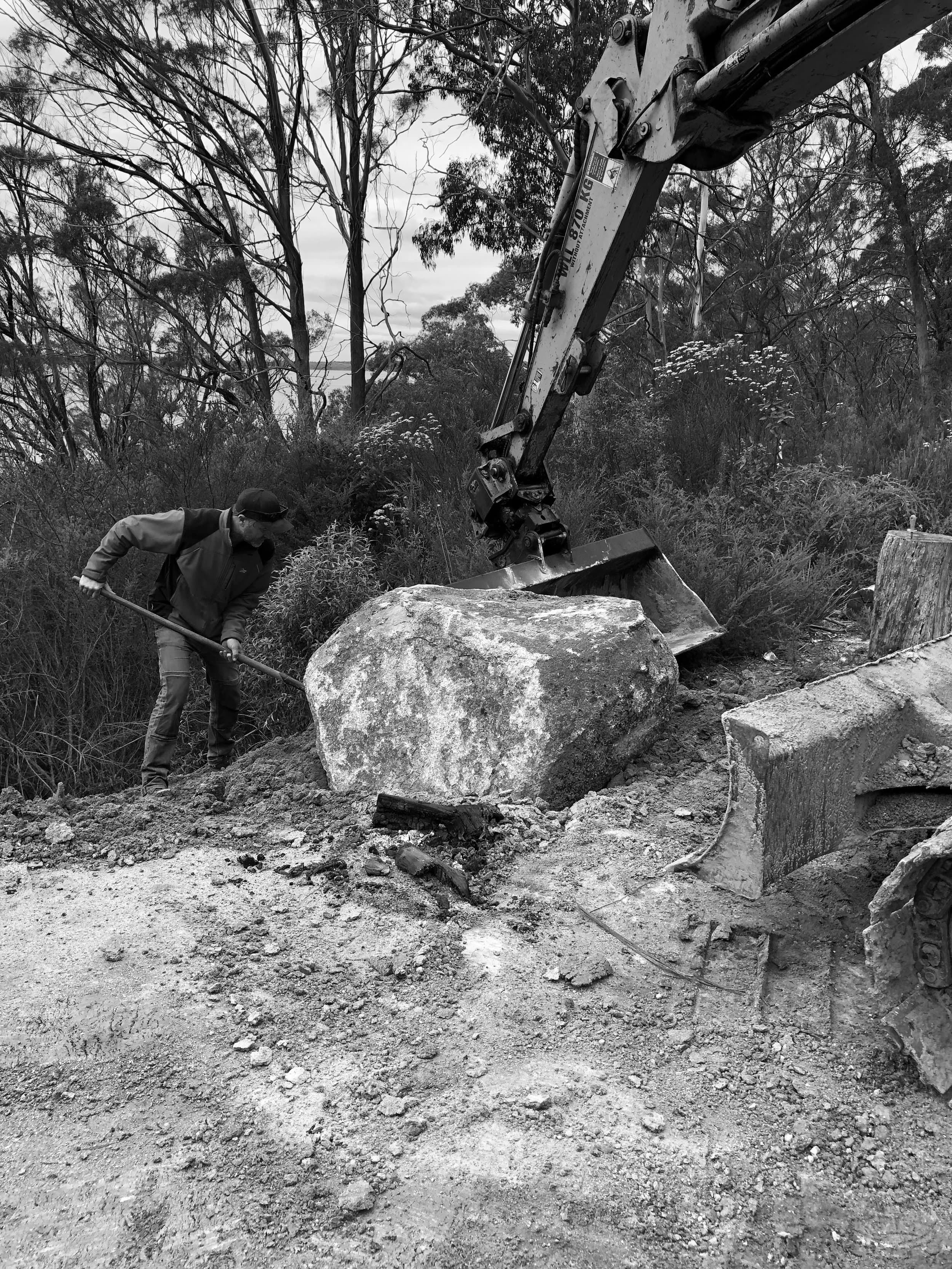 Moving a granite boulder during construction